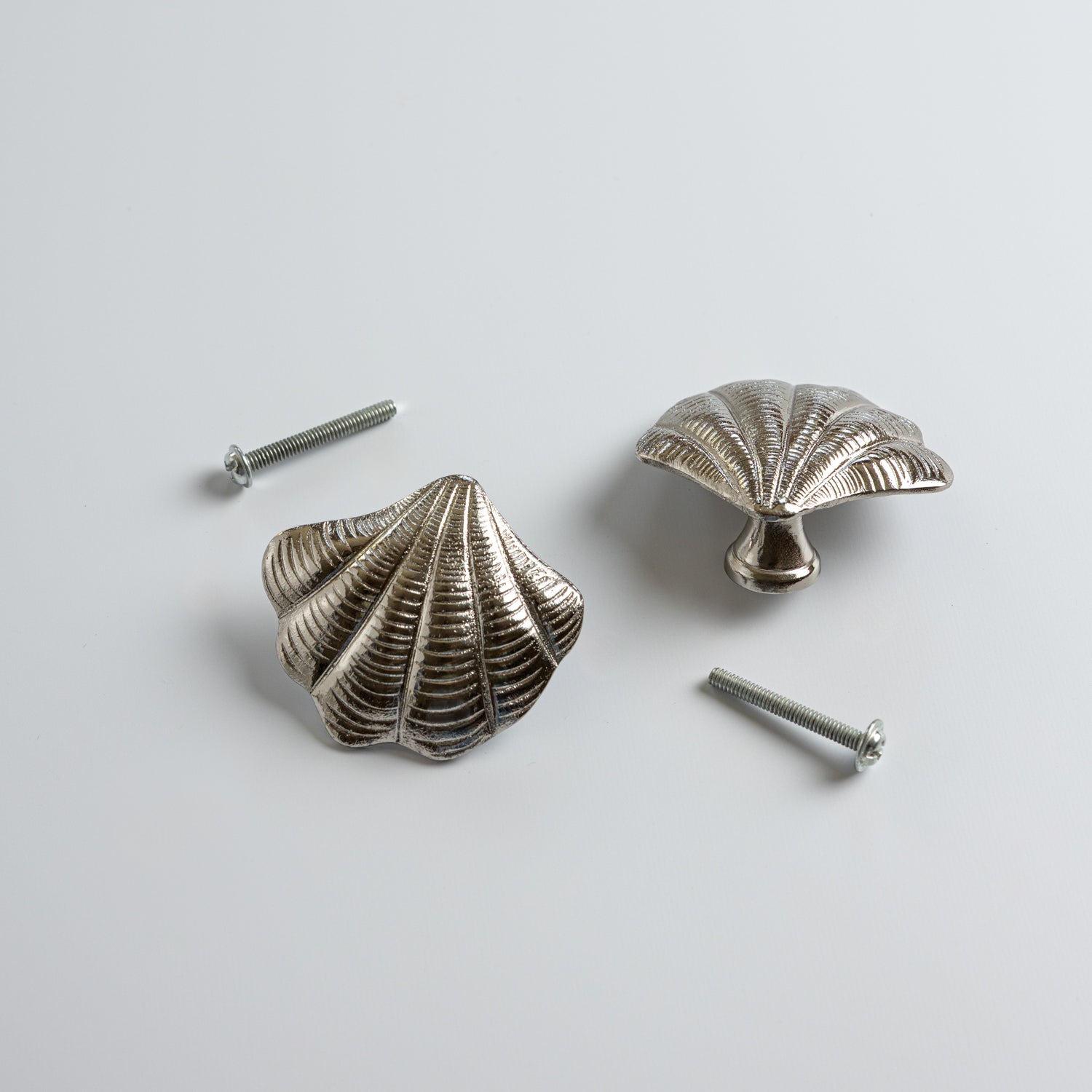 Curved-shell-knob-chrome-brass