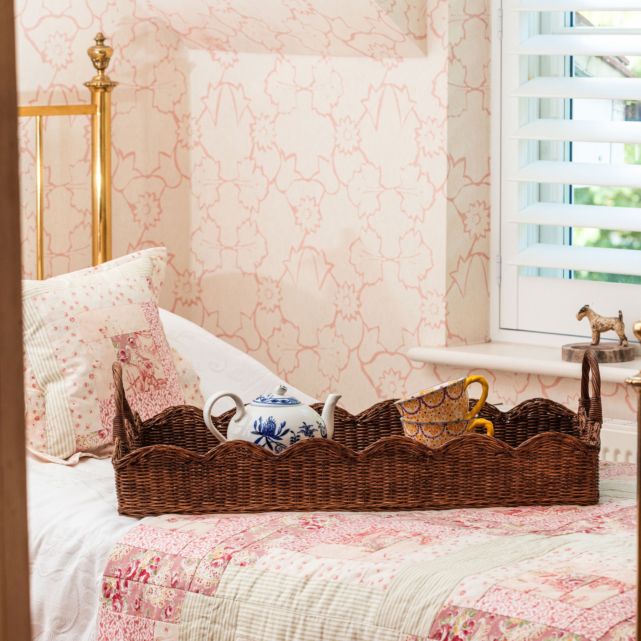 Big-scalloped -tray-teak-on-a-bed