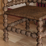 Bobbin-rattan-corner-chair-close-up-legs