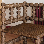Bobbin-rattan-corner-chair-close-up-seat