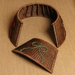 Bow-rattan-christmas-tree-skirt-four-parts-close-up
