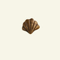 Curved-shell-knob-aged-brass