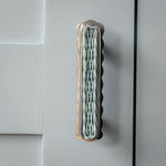 Delilah Handle, Blue & Polished Chrome on a cabinet