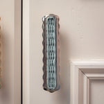 Delilah Handle, Blue & Polished Chrome on a cabinet