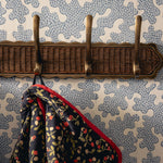 Delilah Hook Rail, Teak & Aged Brass lifestyle closeup