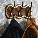 Delilah_Rattan_3-Hook_Rail_Aged_Brass_lifestyle-side-image