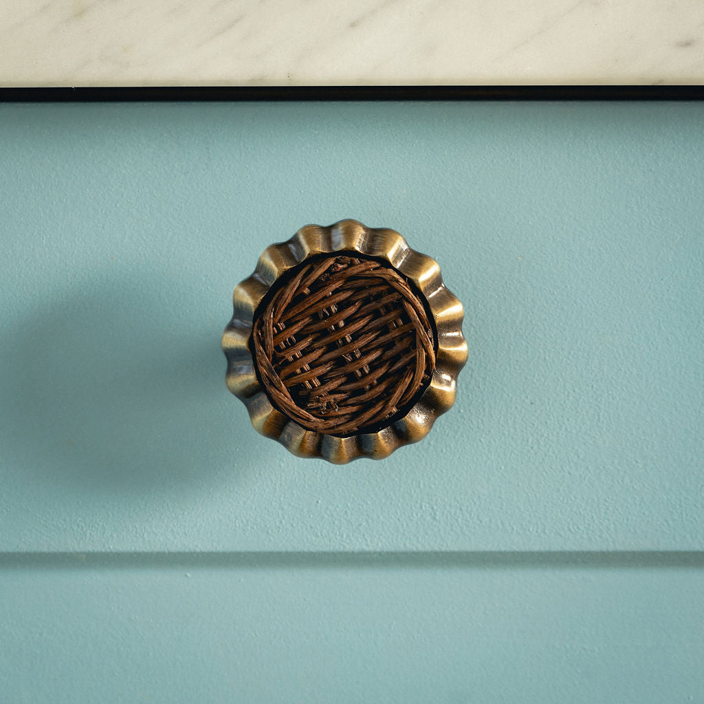 Eloise Round Knob Red, Lacquered Brass blue background 