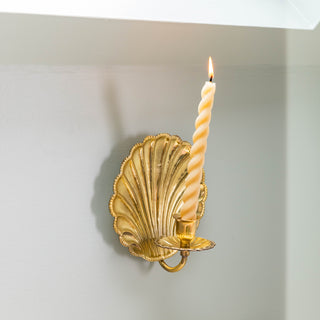 Shell-brass-cabdle-holder-SINGLE-with-candles-burning