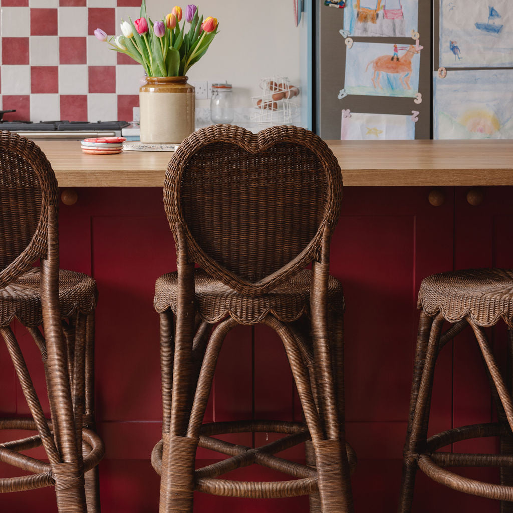Heart-rattan-bar-stool-lifestyle-image-backside