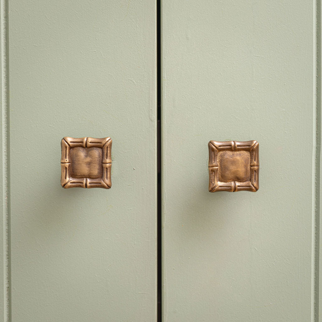 Linley-bamboo-brass-knobs-on-cabinet