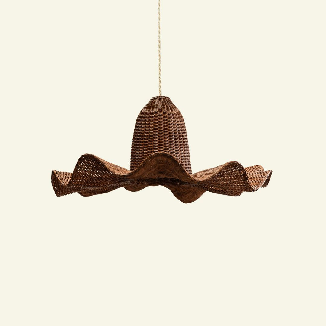Brown wicker pendant light on a beige background
