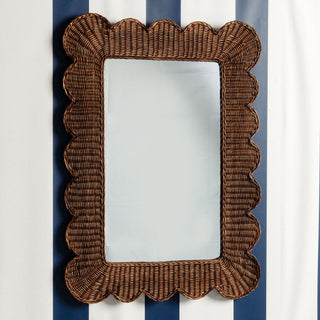 Mimi-scalloped-mirror-large-teak-on-a-wall