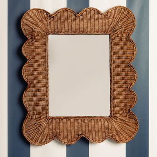 Mimi-scalloped-mirror-medium-teak-on-a-wall