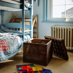 NINA-SCALLOPED-OTTOMAN-TEAK-IN-PLAYROOM