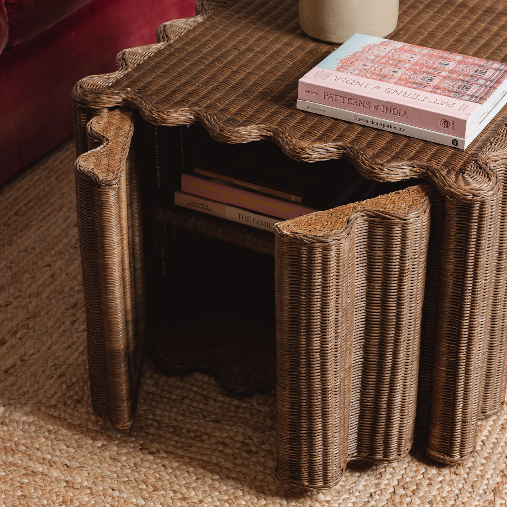 Peony-rattan-coffee-table-with-a-sofa-open-door-close-up-side