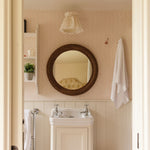Polly-rattan-round-mirror-on-the-wall