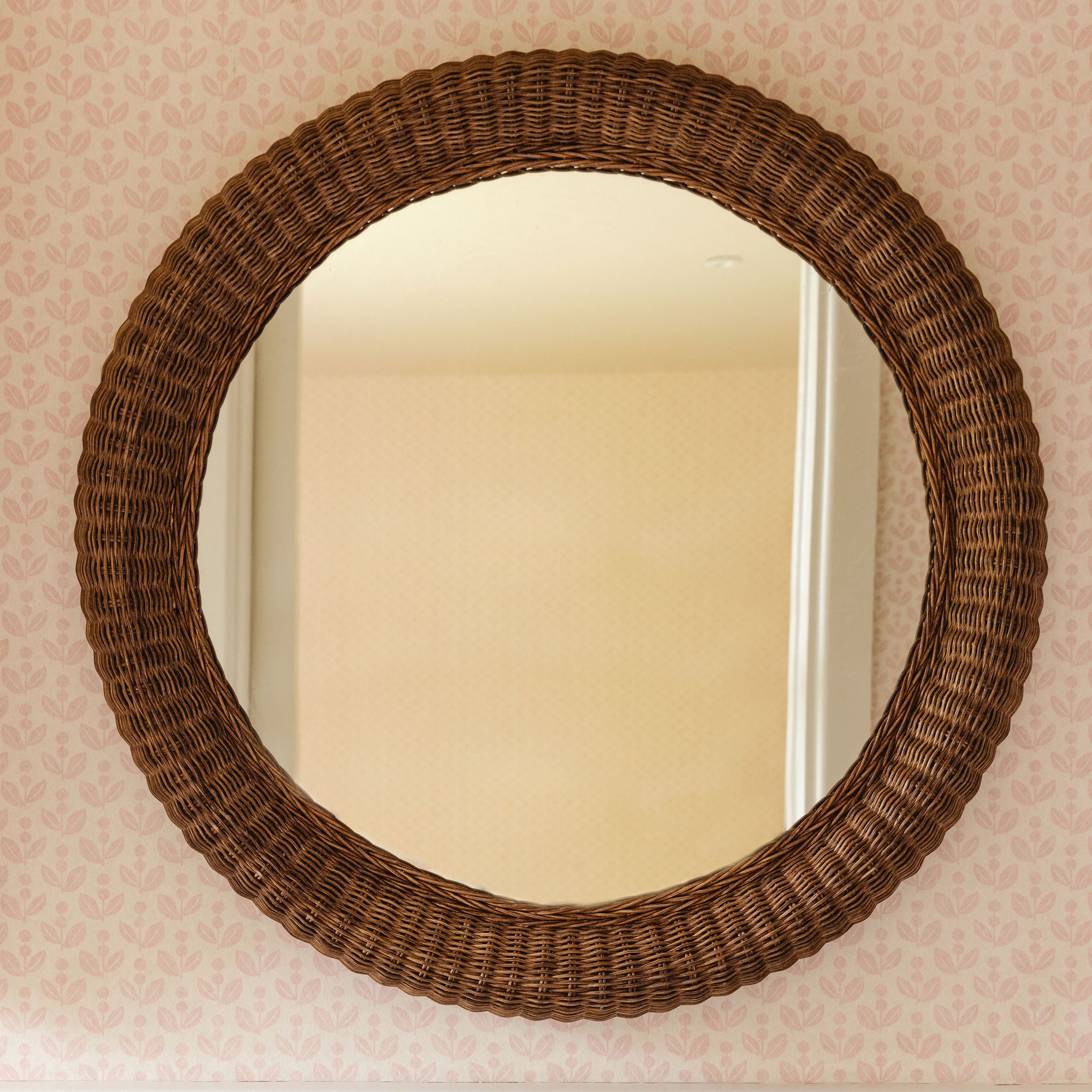 Polly-rattan-round-mirror-front-on