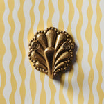 SHELL-BRASS-WALL-HOOK-SINGLE-ON-A-WALL