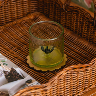 Scalloped-brass-coaster-set-with-rattan-holder