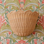 Scalloped-rattan-wall-light-small-natural
