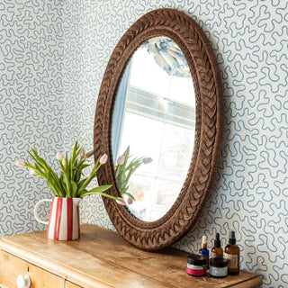 Serena-oval-mirror-teak-large-on-a-chest-of-drawer