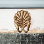 Shell-hook-double-aged-brass-close-up