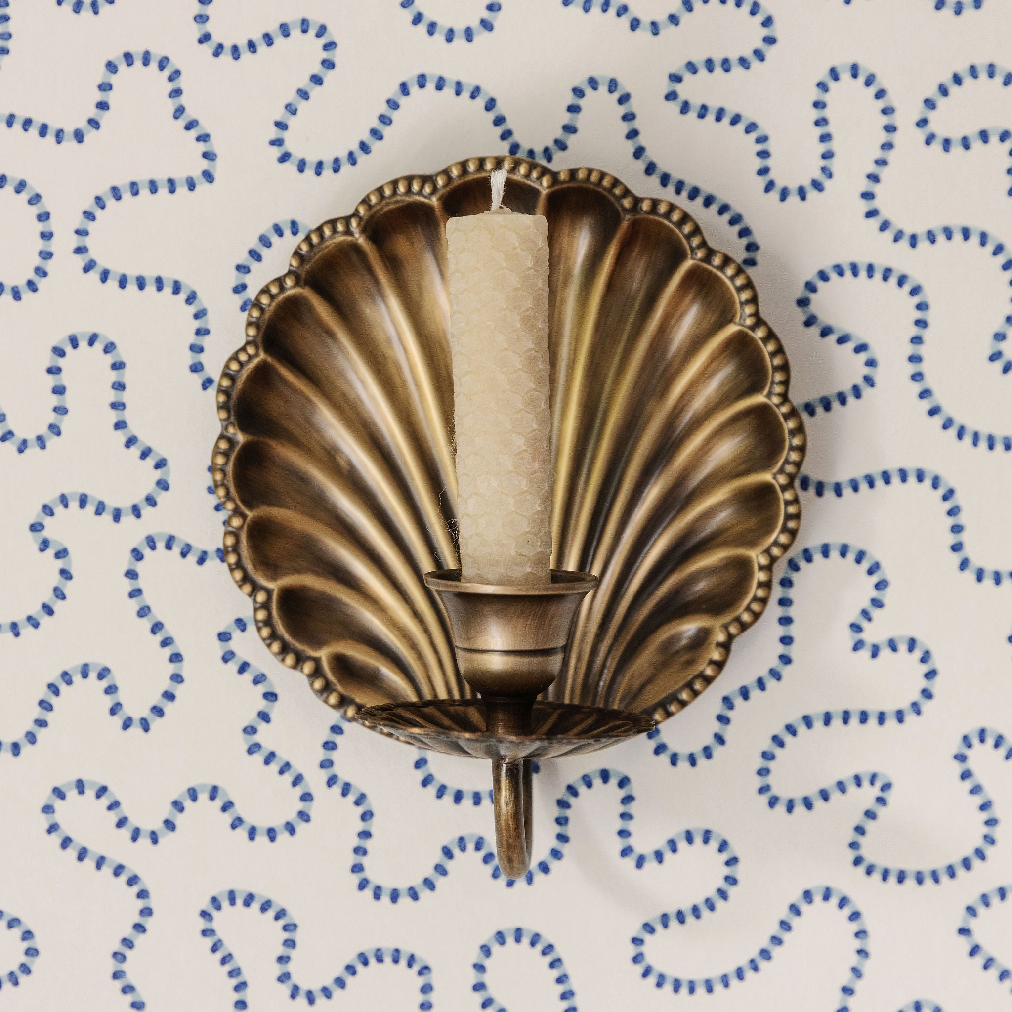 Shell-wall-sconce-single-antique-with-a-candle