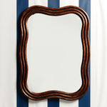 WAVE-RATTAN-MIRROR-LARGE-ON-A-WALL