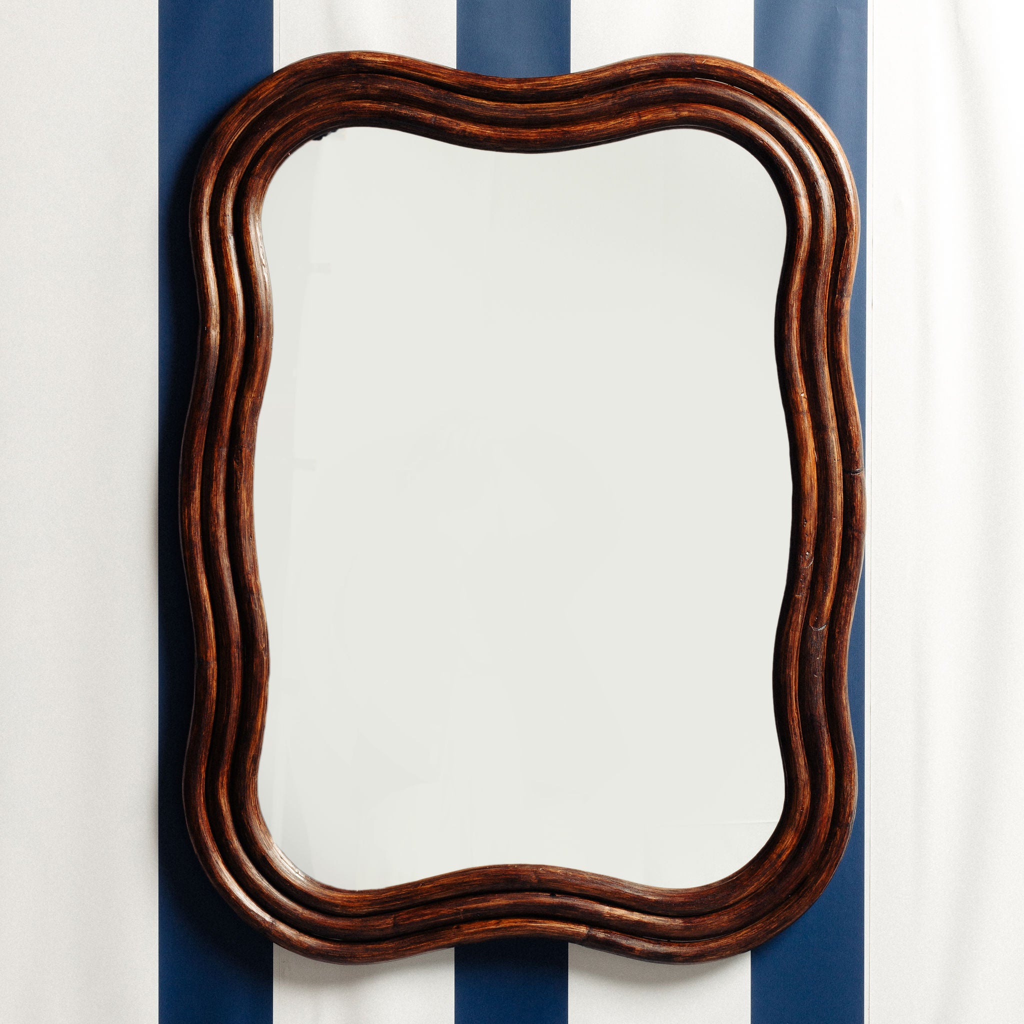 WAVE-RATTAN-MIRROR-LARGE-ON-A-WALL