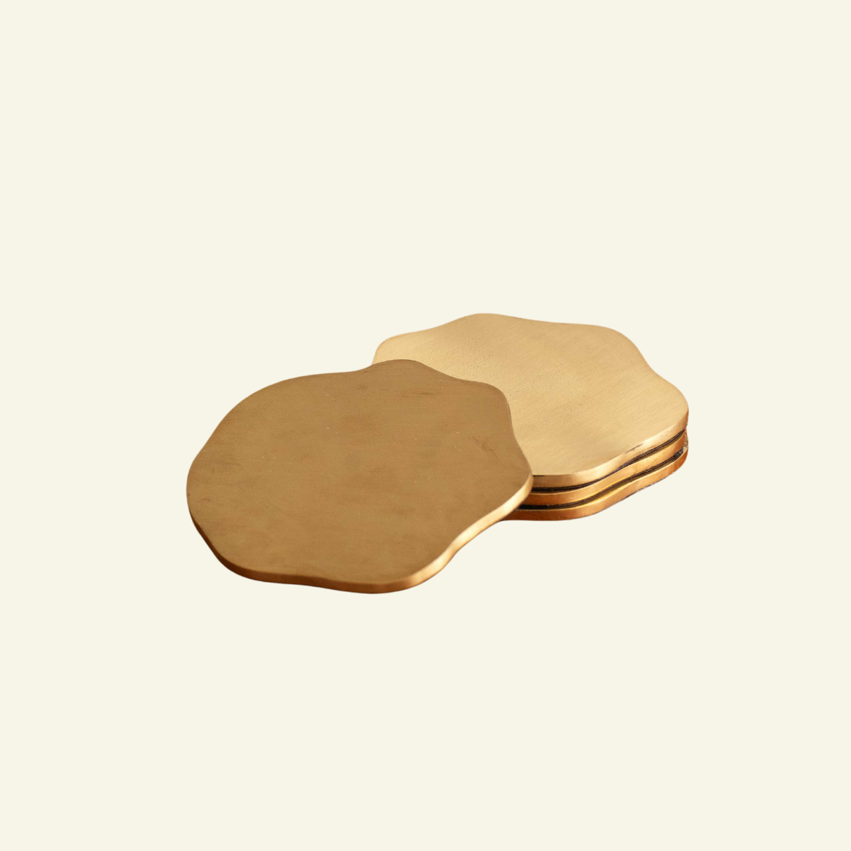 Wavy-brass-coasters-set