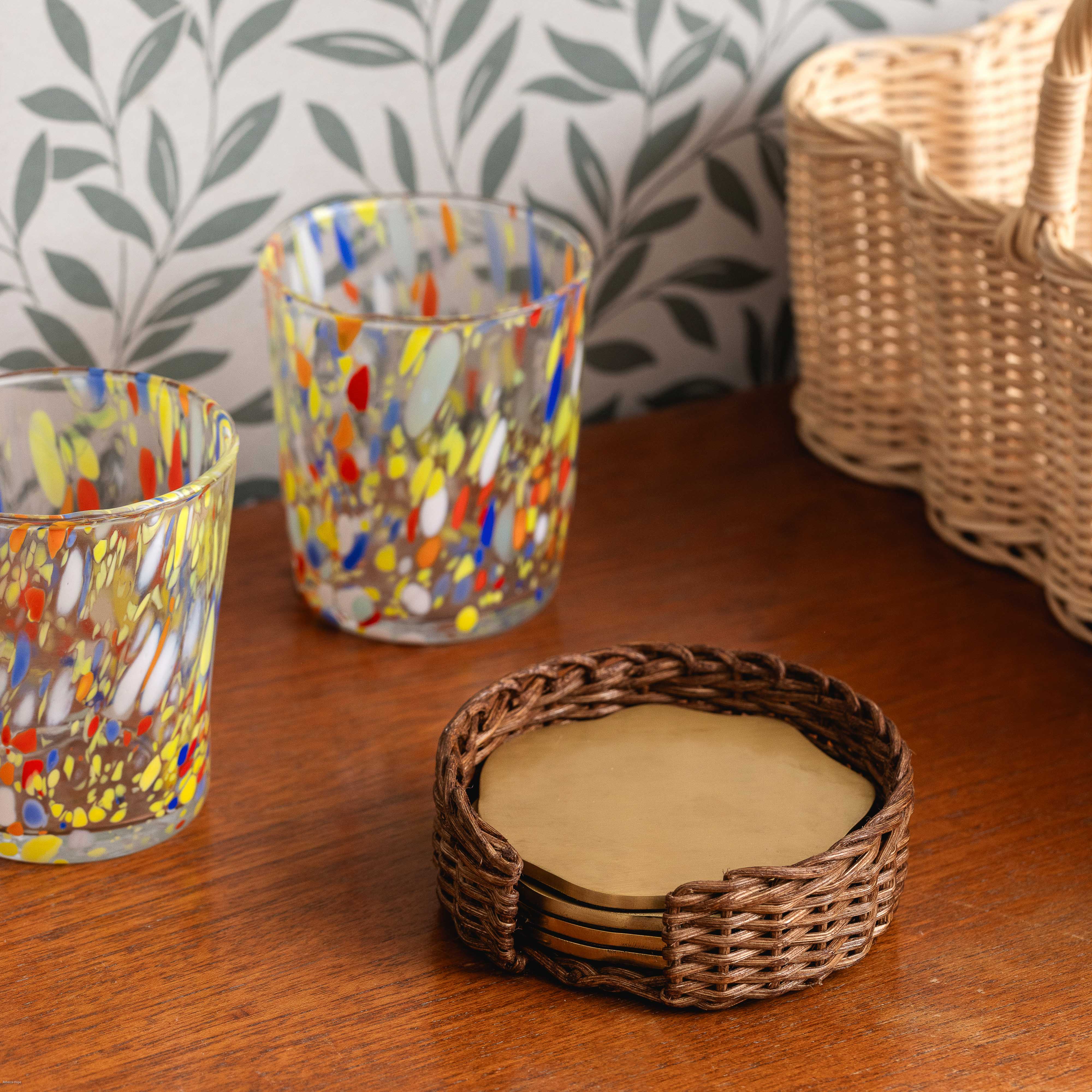 Wavy-Brass-coaster-with-rattan-holder-set-0f-four